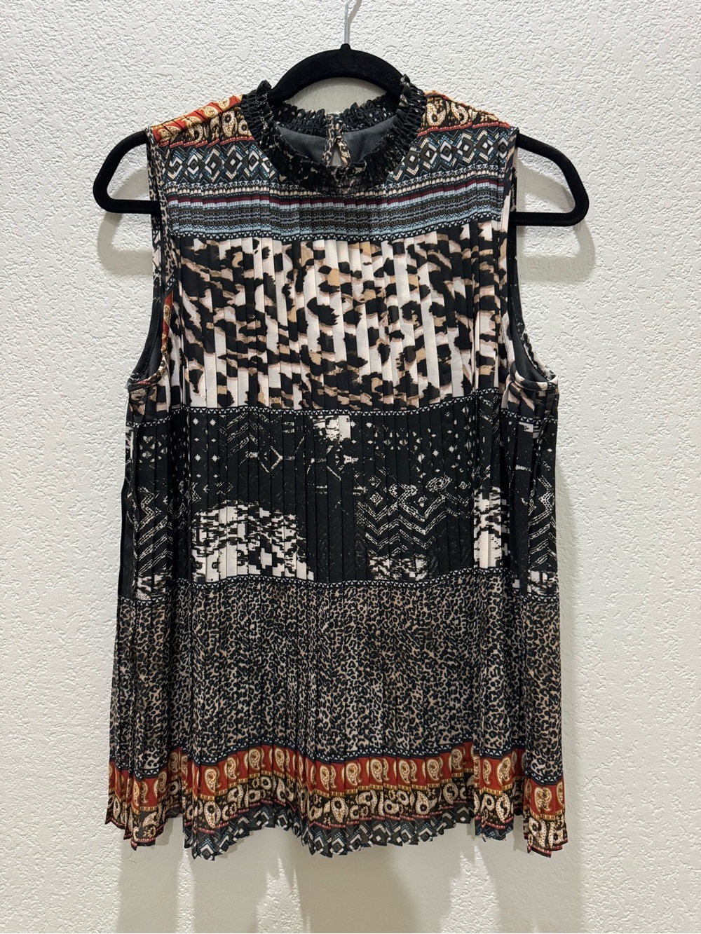 Melissa Paige Black and Cream Mixed-Print Sleeveless Peplum Top with Rust Trim